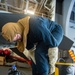 USS Ronald Reagan (CVN 76) Sailors train during a general quarters drill