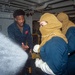 USS Ronald Reagan (CVN 76) Sailors train during a general quarters drill