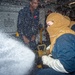 USS Ronald Reagan (CVN 76) Sailors train during a general quarters drill