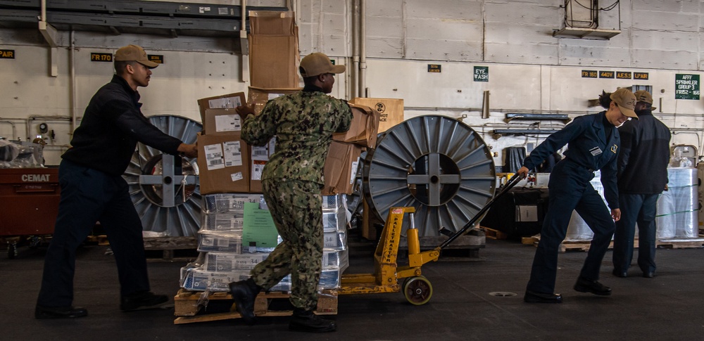 Sailors Move Cleaning Supplies