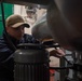 U.S. Navy Sailor Tests Hydraulic Filter