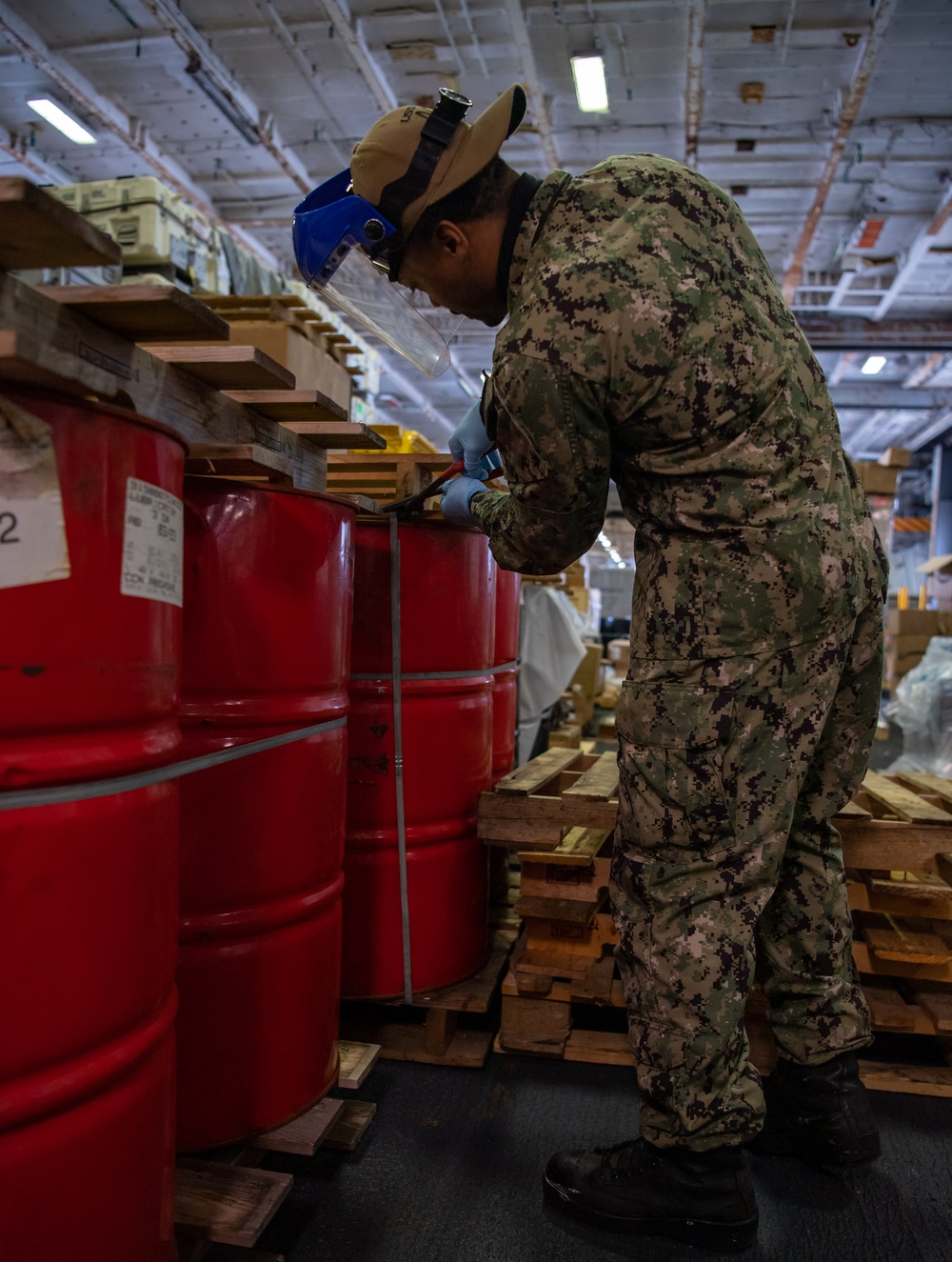 U.S. Navy Sailor Cuts Barrels Loose