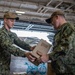 U.S. Navy Sailors Replenish Stock