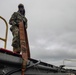 U.S. Navy Sailor Stores Fire Hose