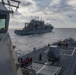 USS Dewey (DDG 105) Conducts Underway Replenishment with USNS Wally Schirra (T-AKE 8) While Operating in the South China Sea