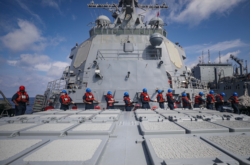 USS Dewey (DDG 105) Conducts Underway Replenishment with USNS Wally Schirra (T-AKE 8) While Operating in the South China Sea