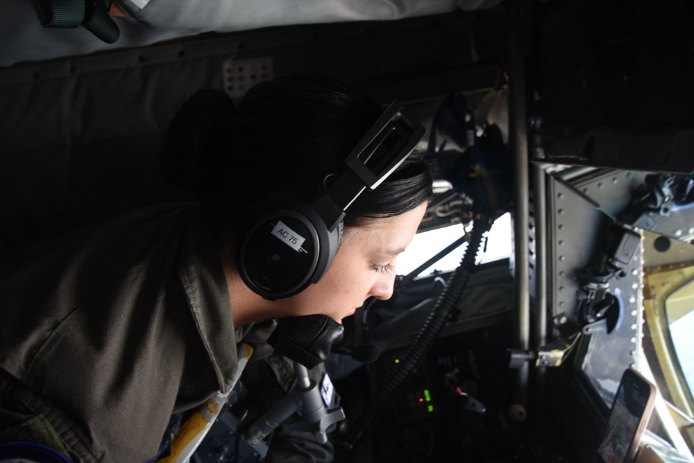 185th ARW, Boom Operator, Staff Sgt. Meleah Johnson lowers the boom of a KC-135 Stratotanker