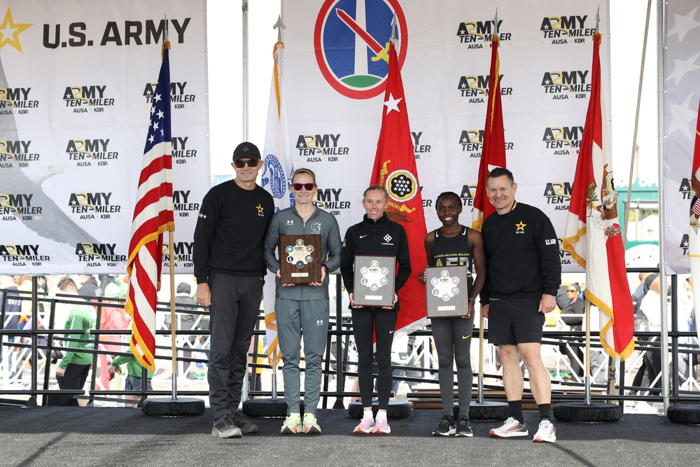 1LT Gray, 3d place finisher in the military female category, with the other winners