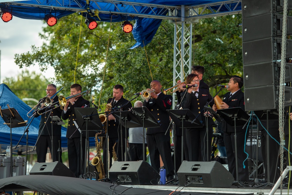 The U.S. Navy Band Cruisers Latin Ensemble performs at Fiesta Baltimore 2023 in Patterson Park in Baltimore, MD