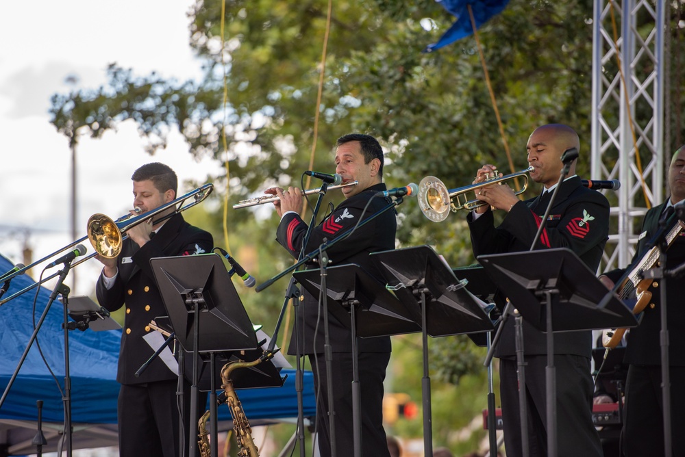 The U.S. Navy Band Cruisers Latin Ensemble performs at Fiesta Baltimore 2023 in Patterson Park in Baltimore, MD