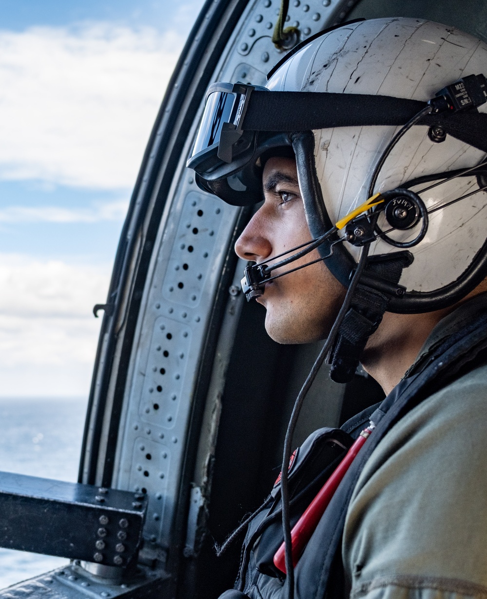 USS Ronald Reagan (CVN 76) Sailors patrol in MH-60S Sea Hawk