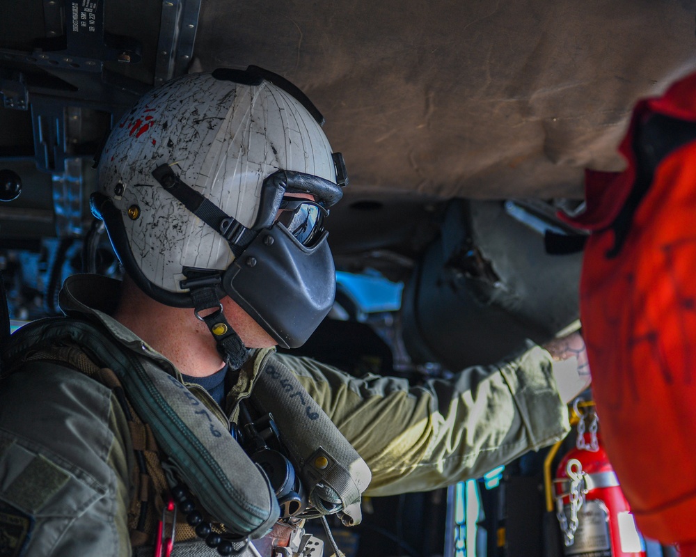 USS Ronald Reagan (CVN 76) and Helicopter Sea Combat Squadron (HSC) 12 Sailors participate in a routine flight