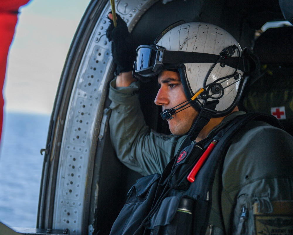 USS Ronald Reagan (CVN 76) and Helicopter Sea Combat Squadron (HSC) 12 Sailors participate in a routine flight