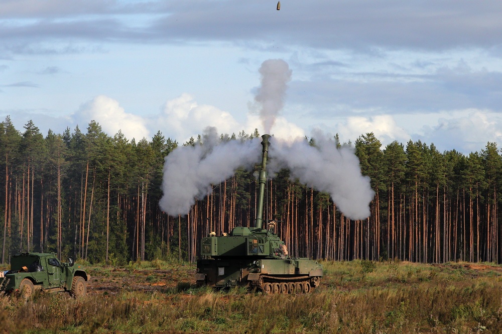 Task Force Marne Paladin crews provide artillery support during Exercise Iron Wolf