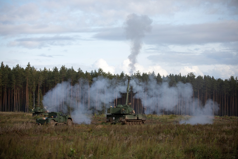 Task Force Marne Paladin crews provide artillery support during Exercise Iron Wolf