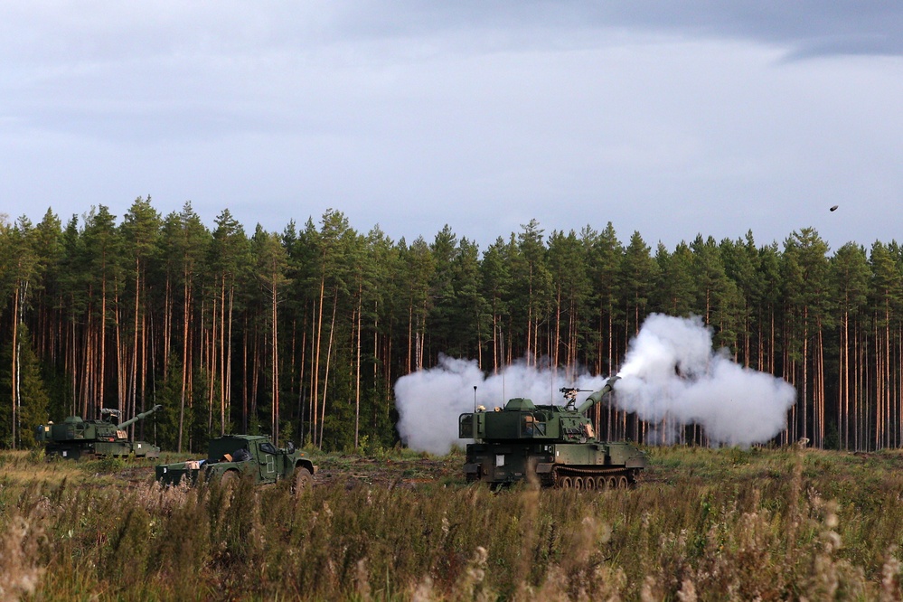 Task Force Marne Paladin crews provide artillery support during Exercise Iron Wolf