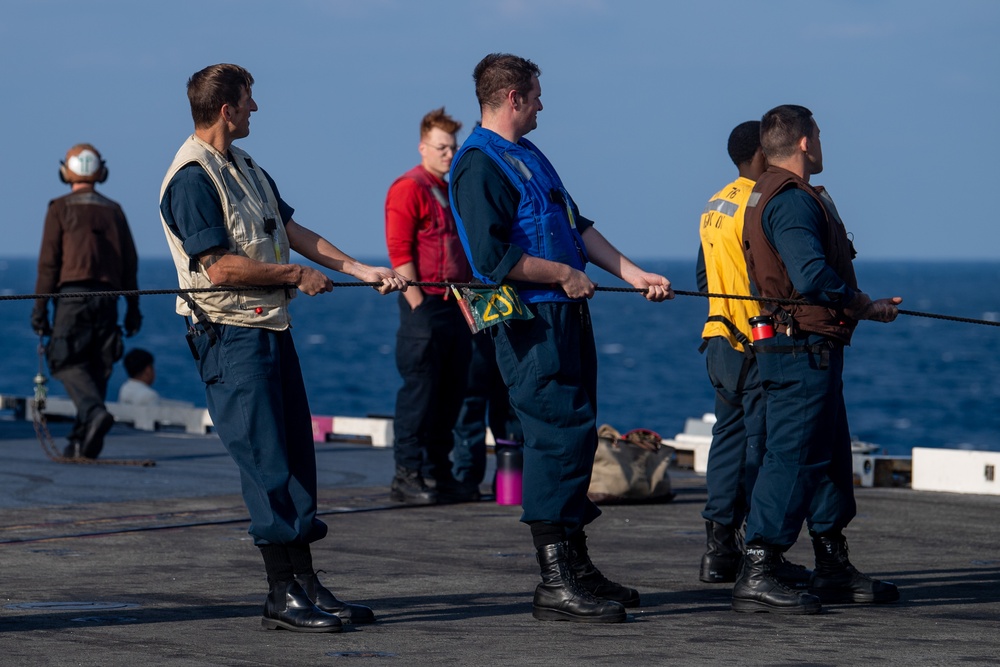 USS Ronald Reagan (CVN 76) conducts fueling-at-sea with USNS Rappahannock (T-AO 204)