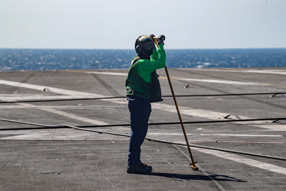 USS Ronald Reagan (CVN 76) Sailors conduct flight operations