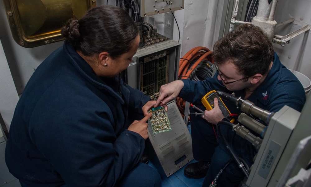 USS Ronald Reagan (CVN 76) Sailors perform maintenance