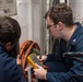 USS Ronald Reagan (CVN 76) Sailors perform maintenance