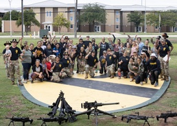 Spouses Earn Their Spurs