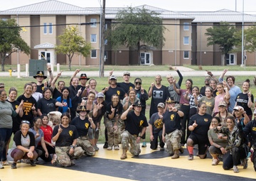 Spouses Earn Their Spurs