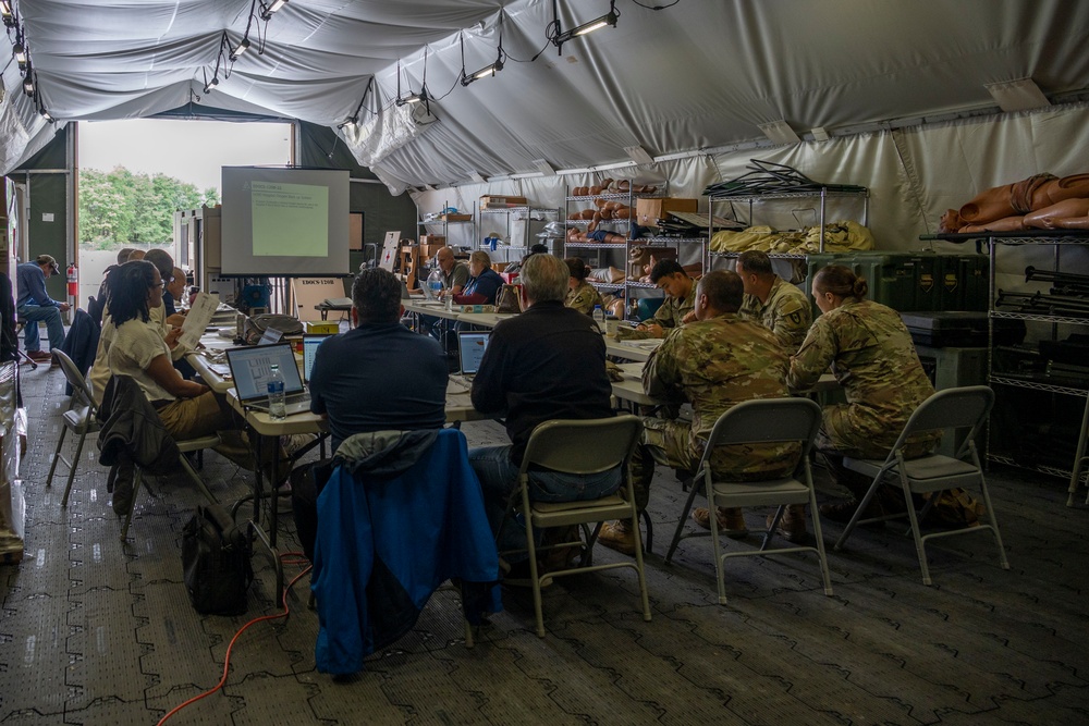 U.S. Army Materiel Command and 44th Medical Brigade get hands-on training with the Expeditionary Deployable Oxygen Concentration System (EDOCS) at USAMMDA