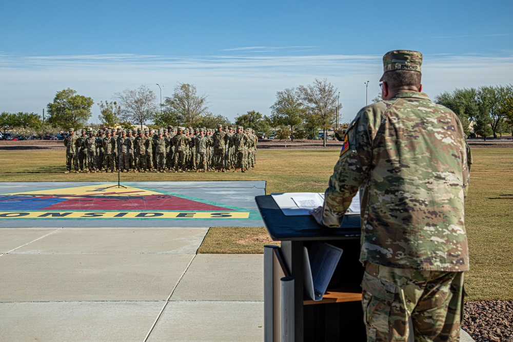 1AD CG re-enlists 120 Soldiers