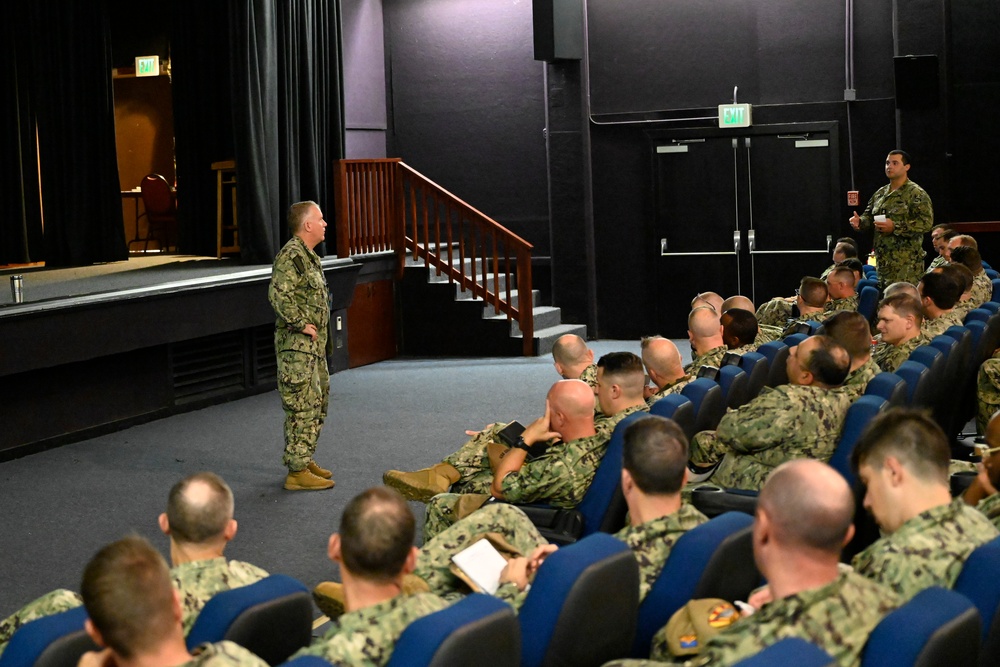Rear Adm. Rick Seif speaks with Sailors