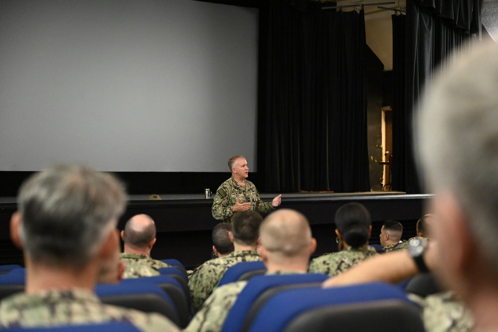 Rear Adm. Rick Seif speaks with Sailors