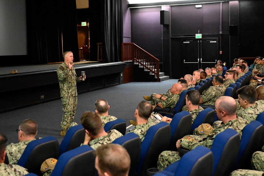 Rear Adm. Rick Seif speaks with Sailors