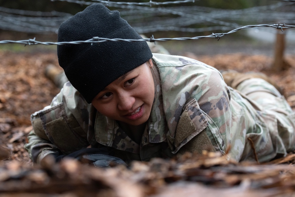 95th Chemical Company Soldiers tackle the obstacle course at JBER