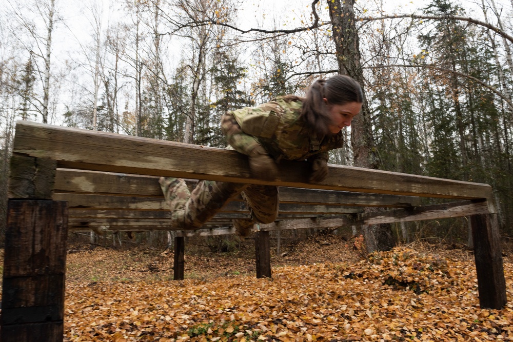 95th Chemical Company Soldiers tackle the obstacle course at JBER