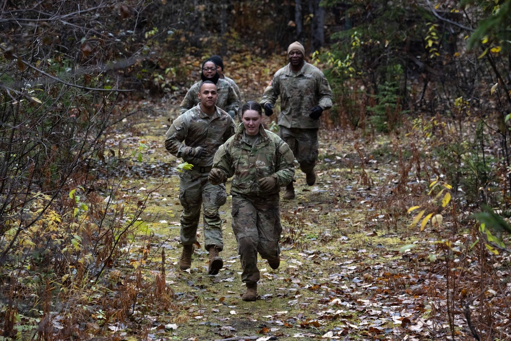 95th Chemical Company Soldiers tackle the obstacle course at JBER