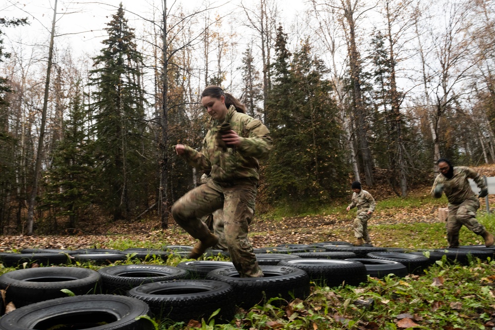 95th Chemical Company Soldiers tackle the obstacle course at JBER