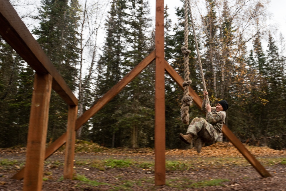 95th Chemical Company Soldiers tackle the obstacle course at JBER