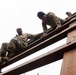 95th Chemical Company Soldiers tackle the obstacle course at JBER