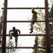 95th Chemical Company Soldiers tackle the obstacle course at JBER