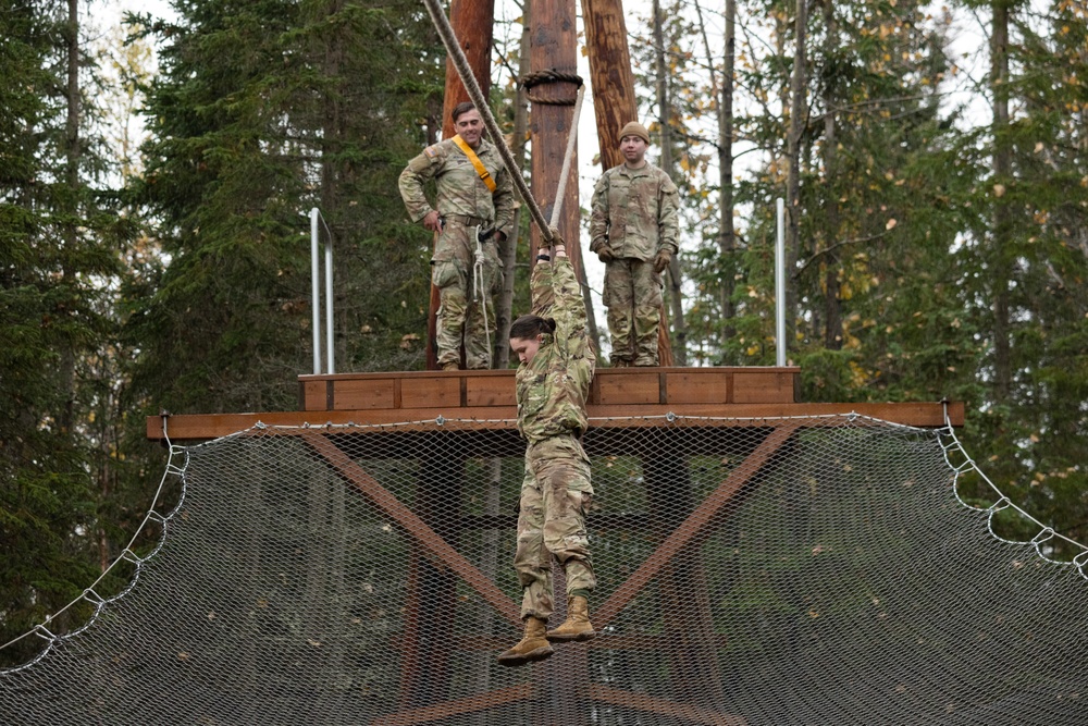 95th Chemical Company Soldiers tackle the obstacle course at JBER