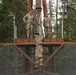 95th Chemical Company Soldiers tackle the obstacle course at JBER