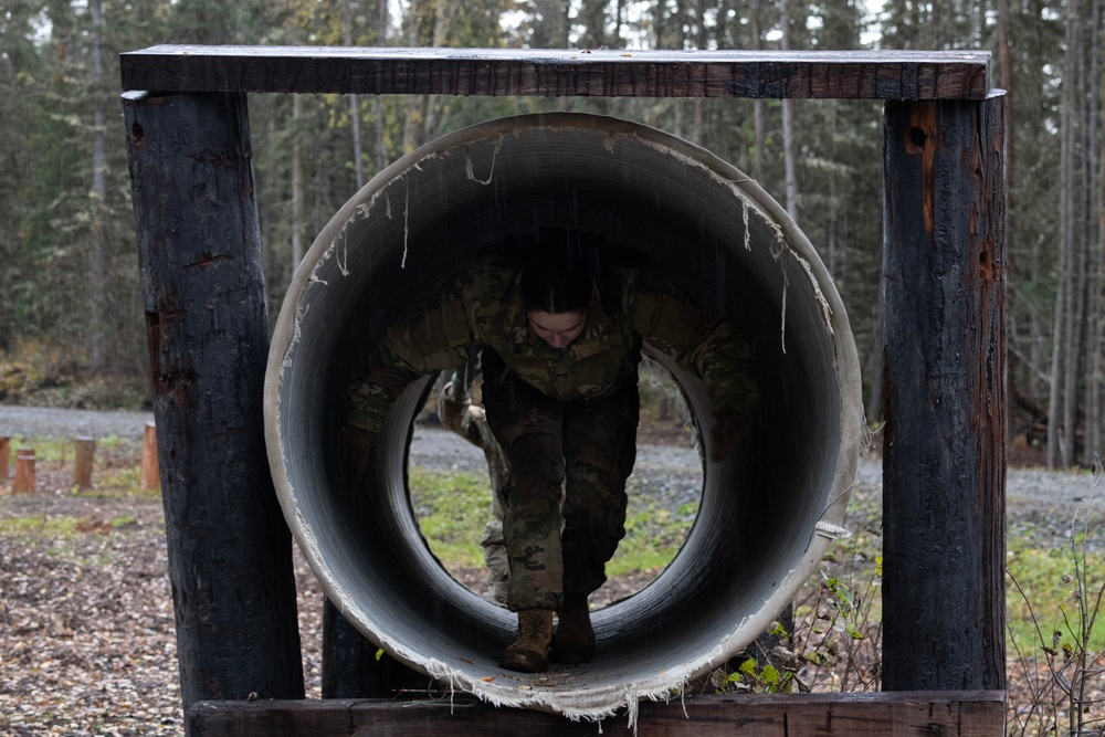 95th Chemical Company Soldiers tackle the obstacle course at JBER