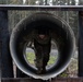 95th Chemical Company Soldiers tackle the obstacle course at JBER