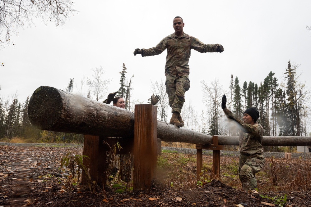 95th Chemical Company Soldiers tackle the obstacle course at JBER