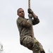 95th Chemical Company Soldiers tackle the obstacle course at JBER