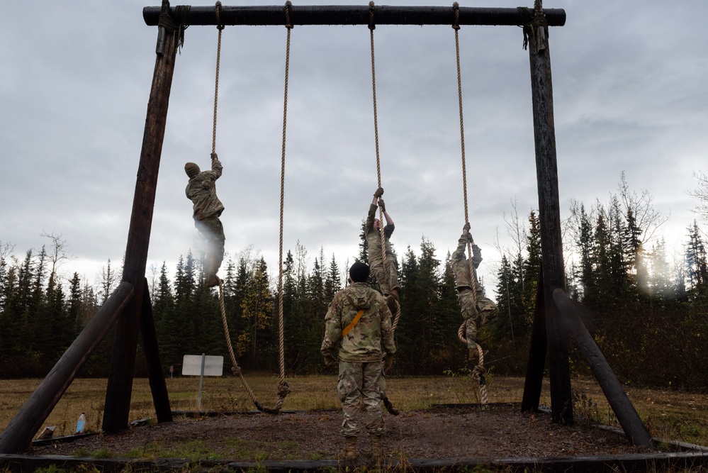 95th Chemical Company Soldiers tackle the obstacle course at JBER