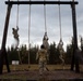 95th Chemical Company Soldiers tackle the obstacle course at JBER