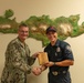 Fire Captain Jonathan Torrez receives JCOQ at NSA Souda Bay