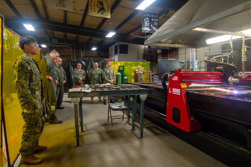 USS John C. Stennis (CVN 74) Leadership visit the Light Industrial Facility