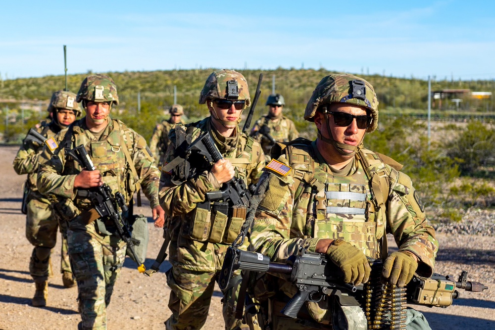 Soldiers march to an extraction point