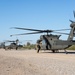 Soldiers load a UH-60 Black Hawk